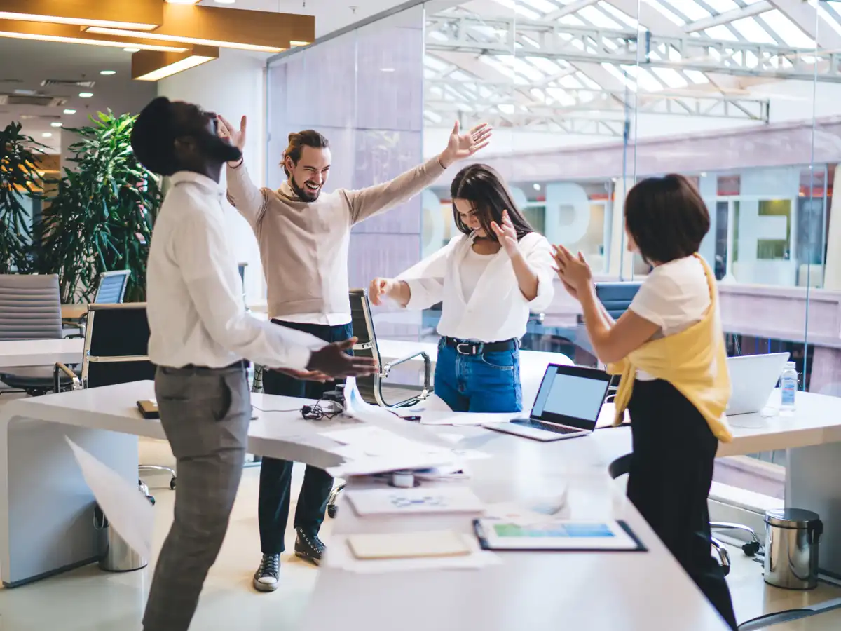 Group of celebrating office workers